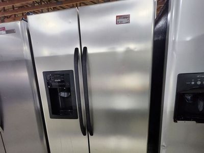 GE Stainless Steel Side-by-Side Refrigerator with a Full Warranty!