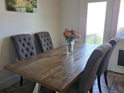 Rustic Farmhouse Dining Table with 4 Upholstered Tufted Chairs - Distressed Wood Top & White Base