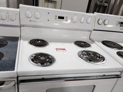 NICE AMERICANA COIL TOP RANGE! WITH A FULL WARRANTY