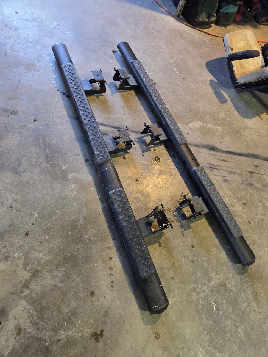 Dodge side steps set idk what they fit but they say dodge on them