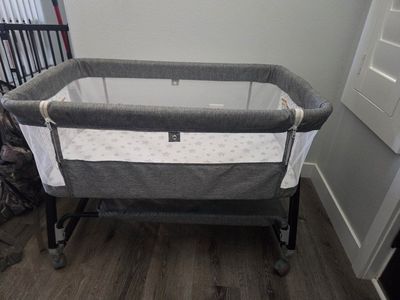 Gray Mesh Baby Bassinet with Storage Shelf and Wheels