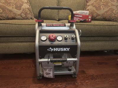 Husky 4.5 Gallon 200 PSI Quiet Portable Electric Air Compressor with 3/8 in. x 50 ft. Hybrid Air Hose