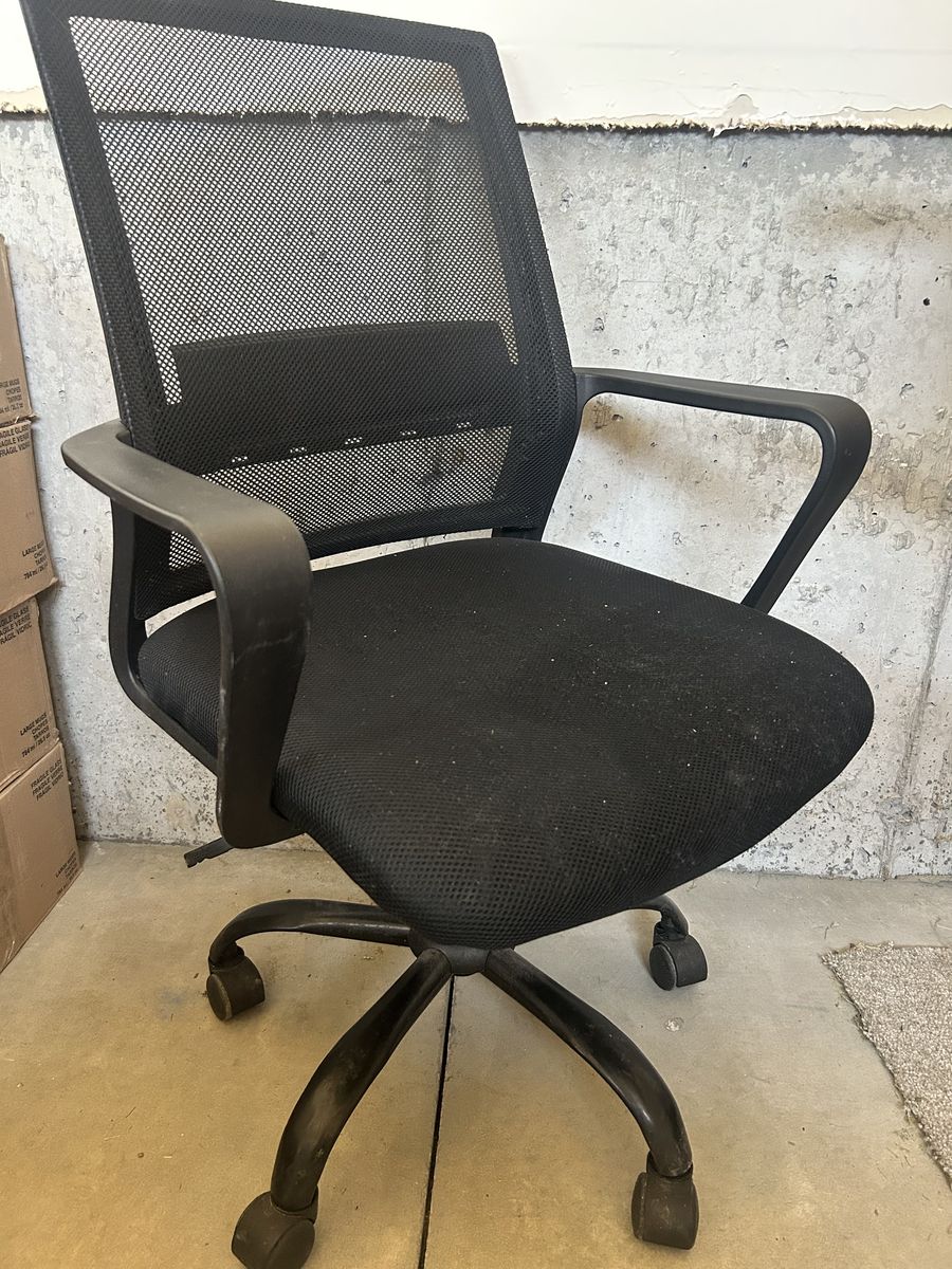 Used office chair.  Fabric cushion mesh back wheels