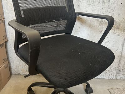 Used office chair. Fabric cushion mesh back wheels
