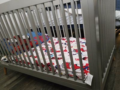 grey crib