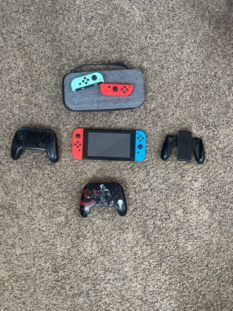 Nintendo Switch With Games And Controllers