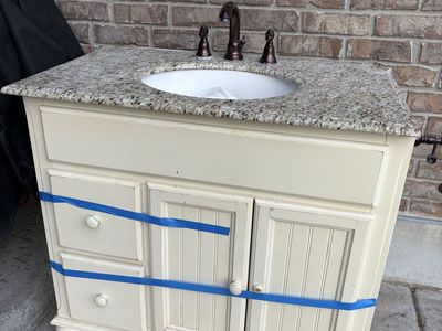 Cream Bathroom Vanity with Granite Countertop & Bronze Faucet - Single Sink
