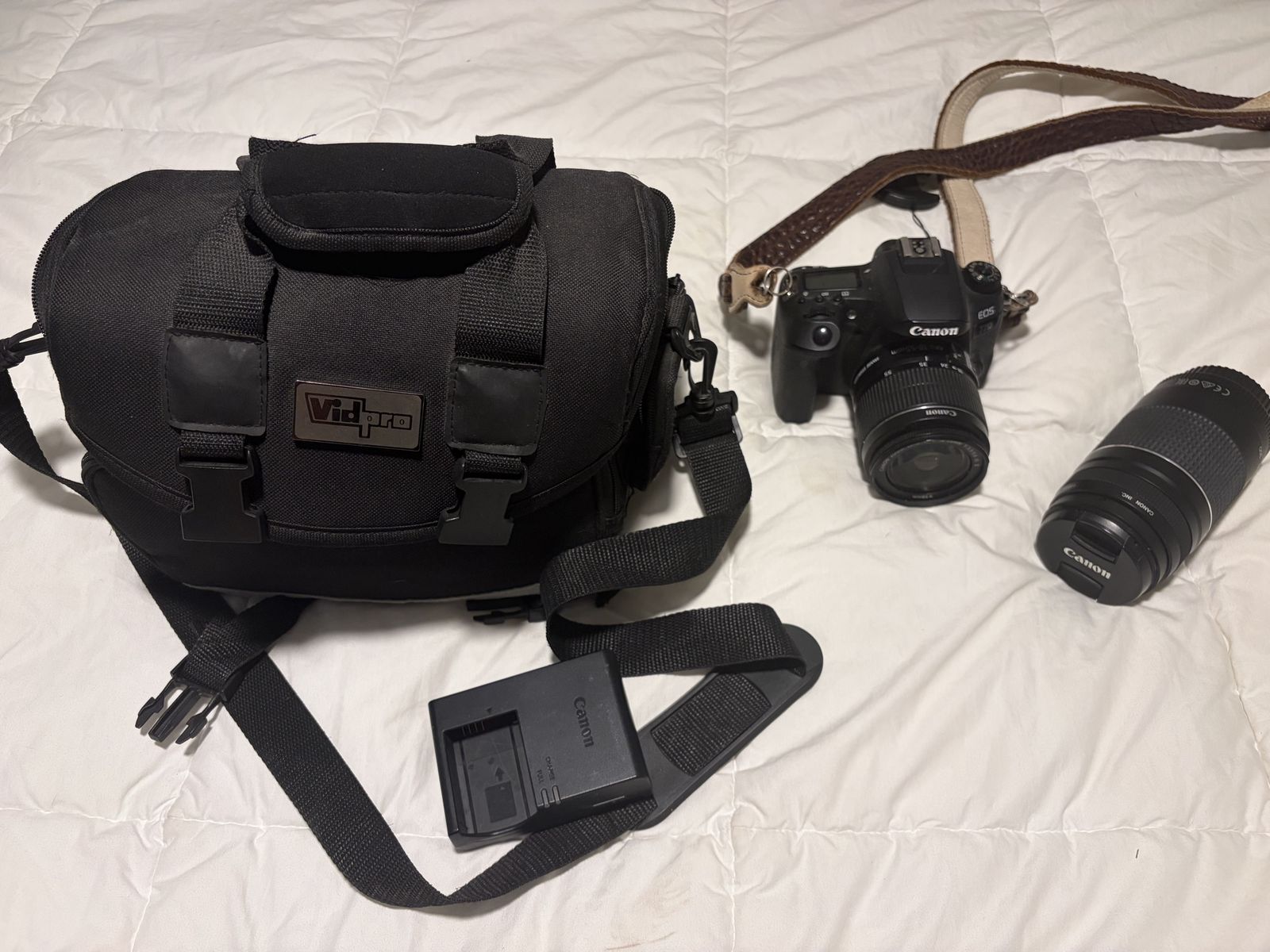 Canon EOS 77D DSLR Camera Bundle with 18-55mm Lens, 75-300mm Lens, Vidpro Bag, and Charger