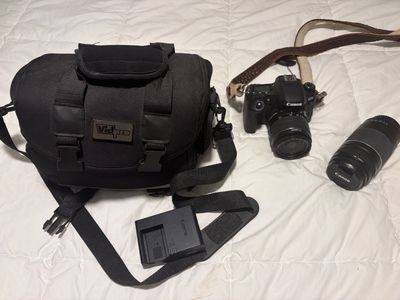 Canon EOS 77D DSLR Camera Bundle with 18-55mm Lens, 75-300mm Lens, Vidpro Bag, and Charger