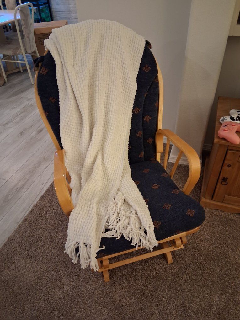 Rocking chair with matching ottoman (25 years old)