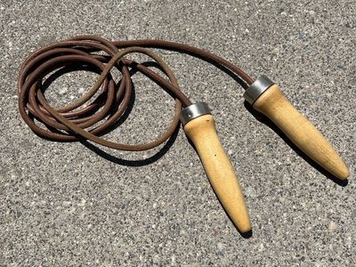 Vintage leather and ball-bearing wood handle jump rope