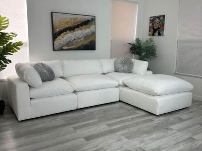 Modern white sectional sofa with oversized chaise #Couch
