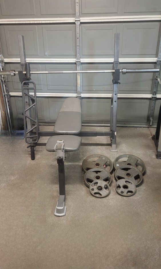 bench and 130 pounds of weights