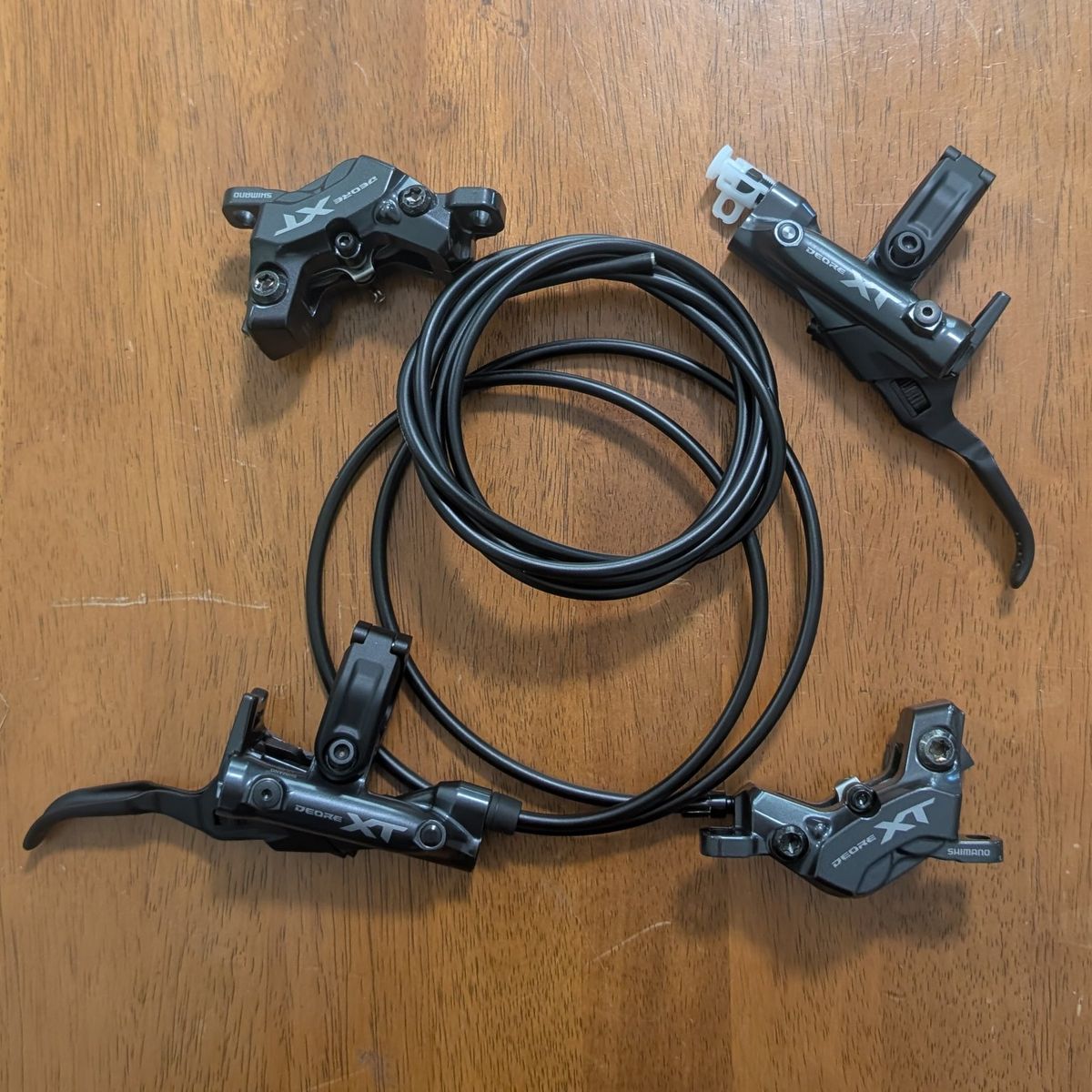 NEW Shimano XT M8220 Brakes w/ P03A Pads (Front & Rear)