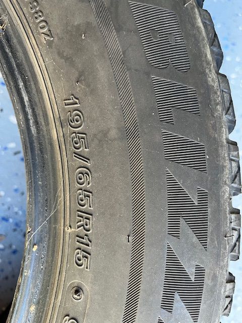 Free. One unmounted, winter Bridegestone Blizzak tire 195 65 R15