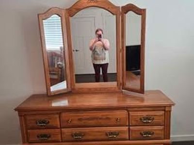 Beautiful, large wooden dresser and matching mirror