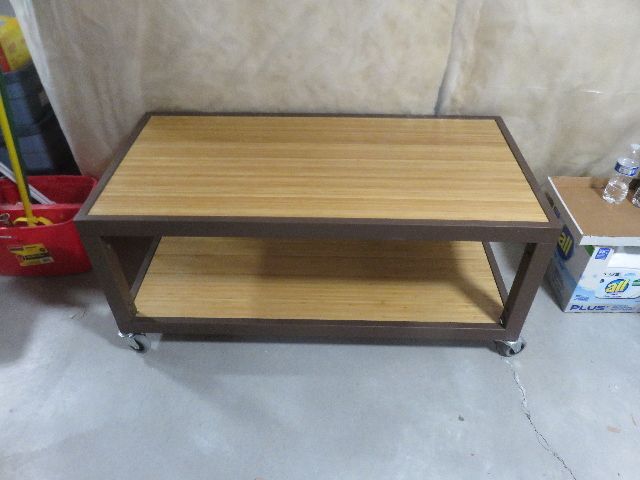 VERY HEAVY DUTY STEEL TWO SHELF TABLE WITH INDUSTRIAL LOCKABLE CASTERS AND DECORATIVE SHELVING