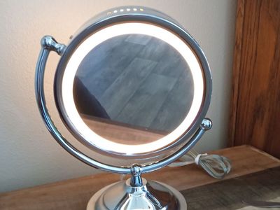 Chrome dual lighted vanity mirror two sided two light settings and 360 rotation