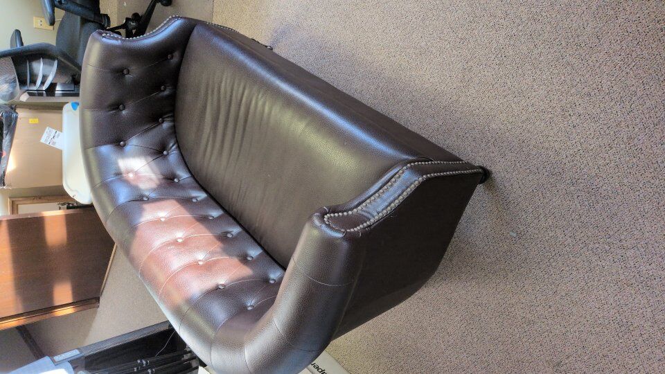 tufted leather love seat