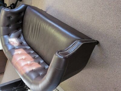 tufted leather love seat