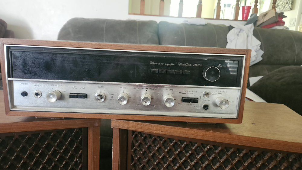 vintage sansui 5000x stereo receiver featuring a walnut wood cabinet