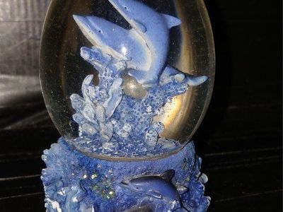 A Dolphin water globe