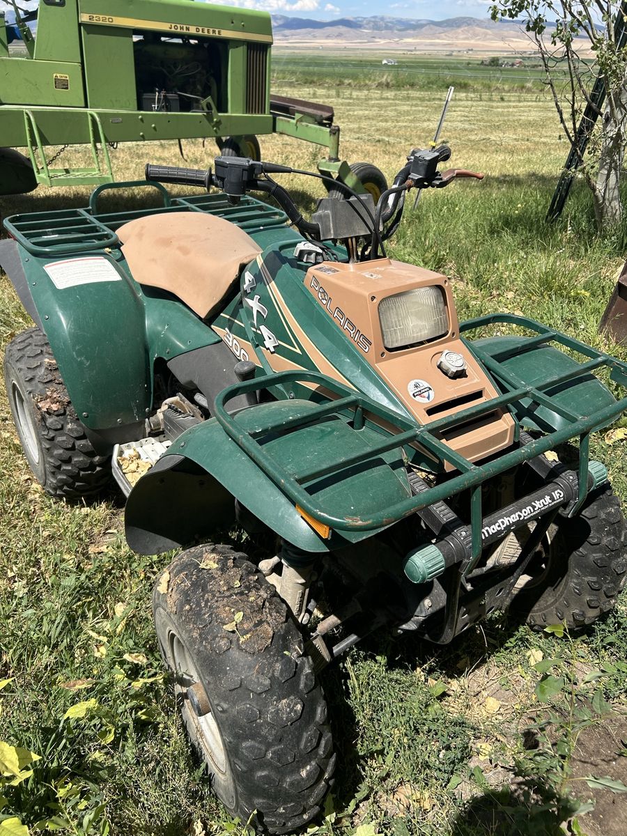 Polaris 300 4x4 ATV (Green/Tan) - Off-Road Utility Vehicle