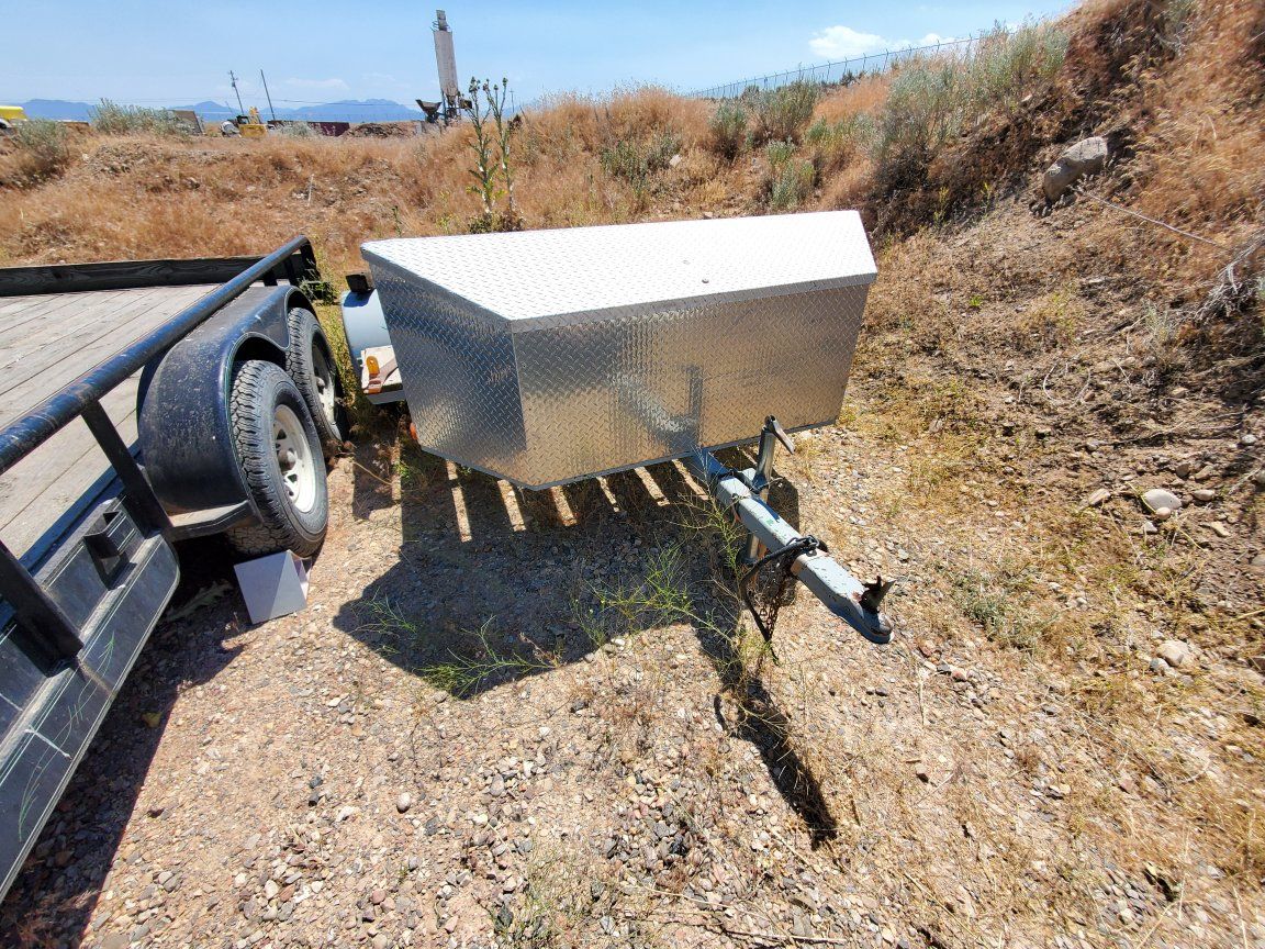 home Built Utility Trailer with Diamond Plate Toolbox.