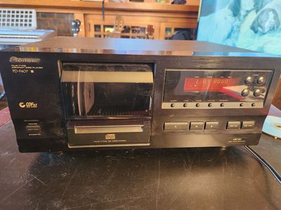 CD player for a stereo. Holds 25 CDs. Plays perfect. Perfect shape.