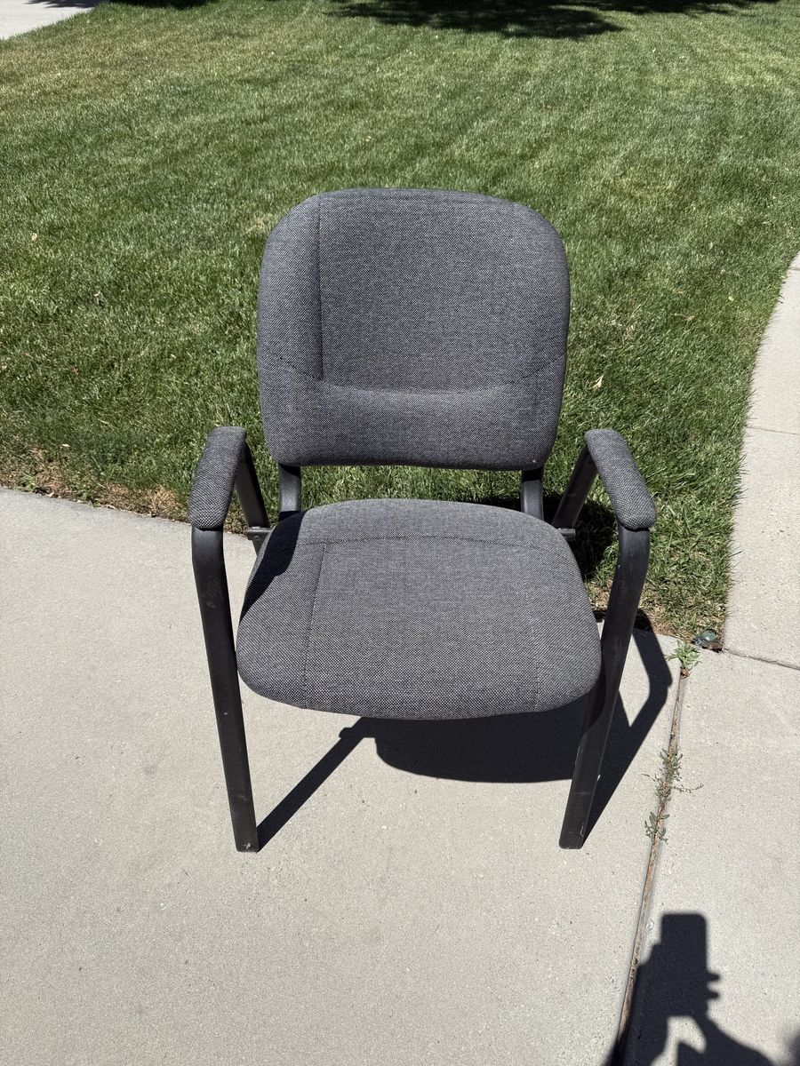 Stackable padded arm chairs