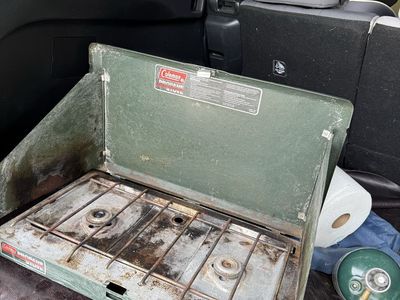 Coleman Butane Camp Stove with extra Tanks and cover
