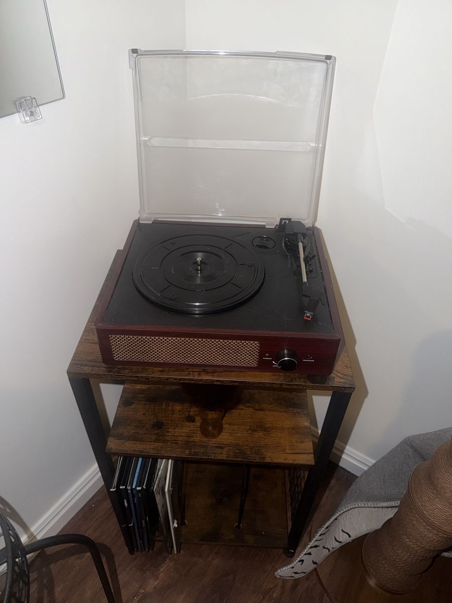 Vinyl player w table and cds