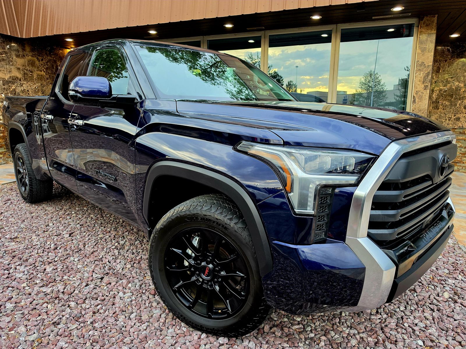2023 Toyota Tundra Limited — rebuilt & branded title, 24% below market