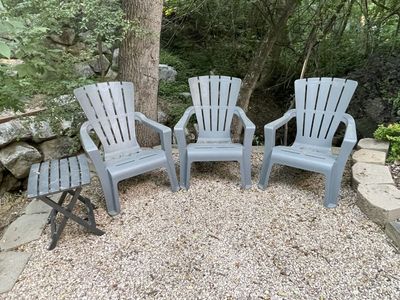 5 Outdoor chairs and 2 folding tables
