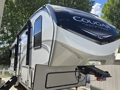 2022 Keystone Cougar 29MBS, 3 Slide Outs, Sleeps 9. Well optioned.