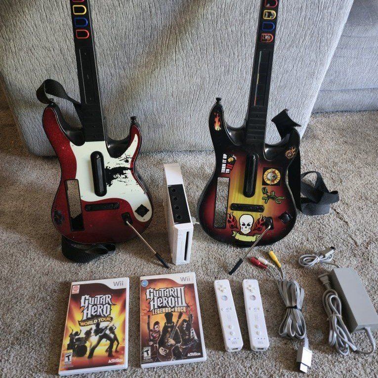 Nintendo Wii Bundle with 2 Guitar Controllers and Games
