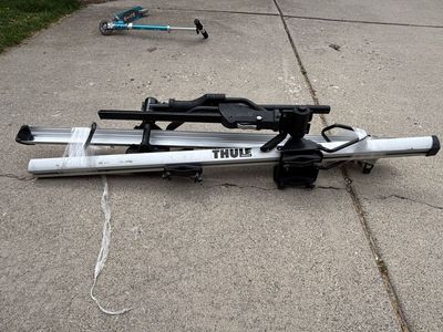 Two Thule Roof Bike Racks