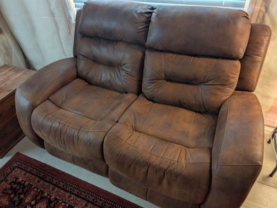 Leather Sofa and Loveseat with electric reclining leg rest