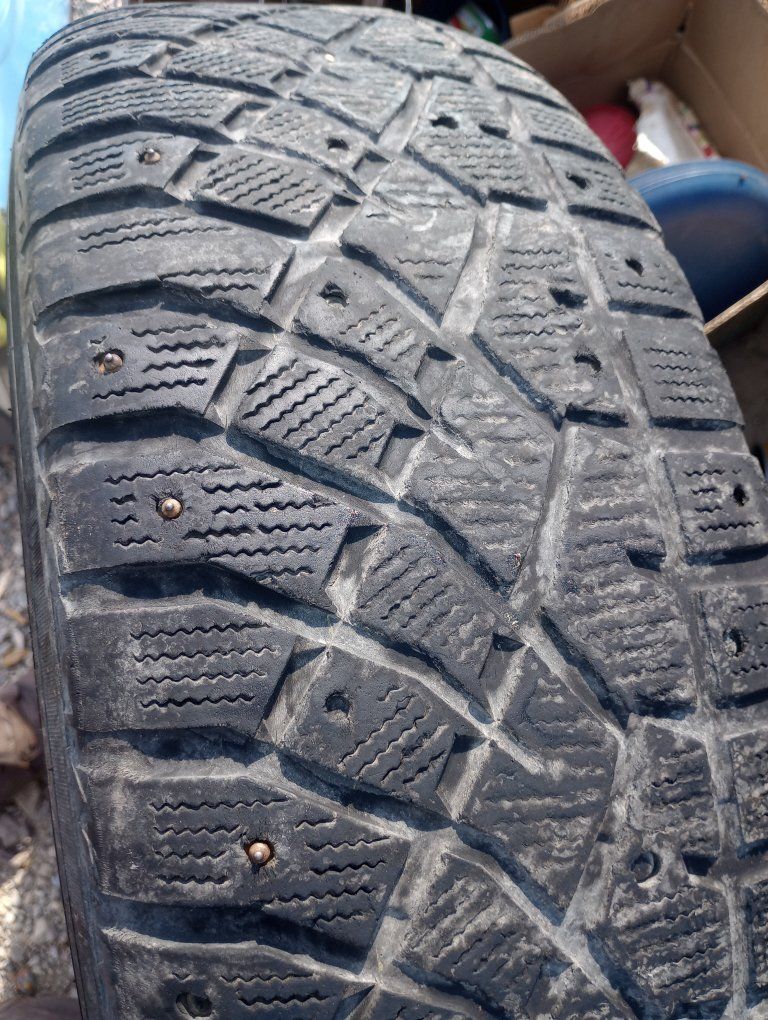 Artic Claw Used studded truck snow Tires 4,  215/75R/16" mounted on Chevy 6 lug rims, or will fit any 16" rims ( selling as is )