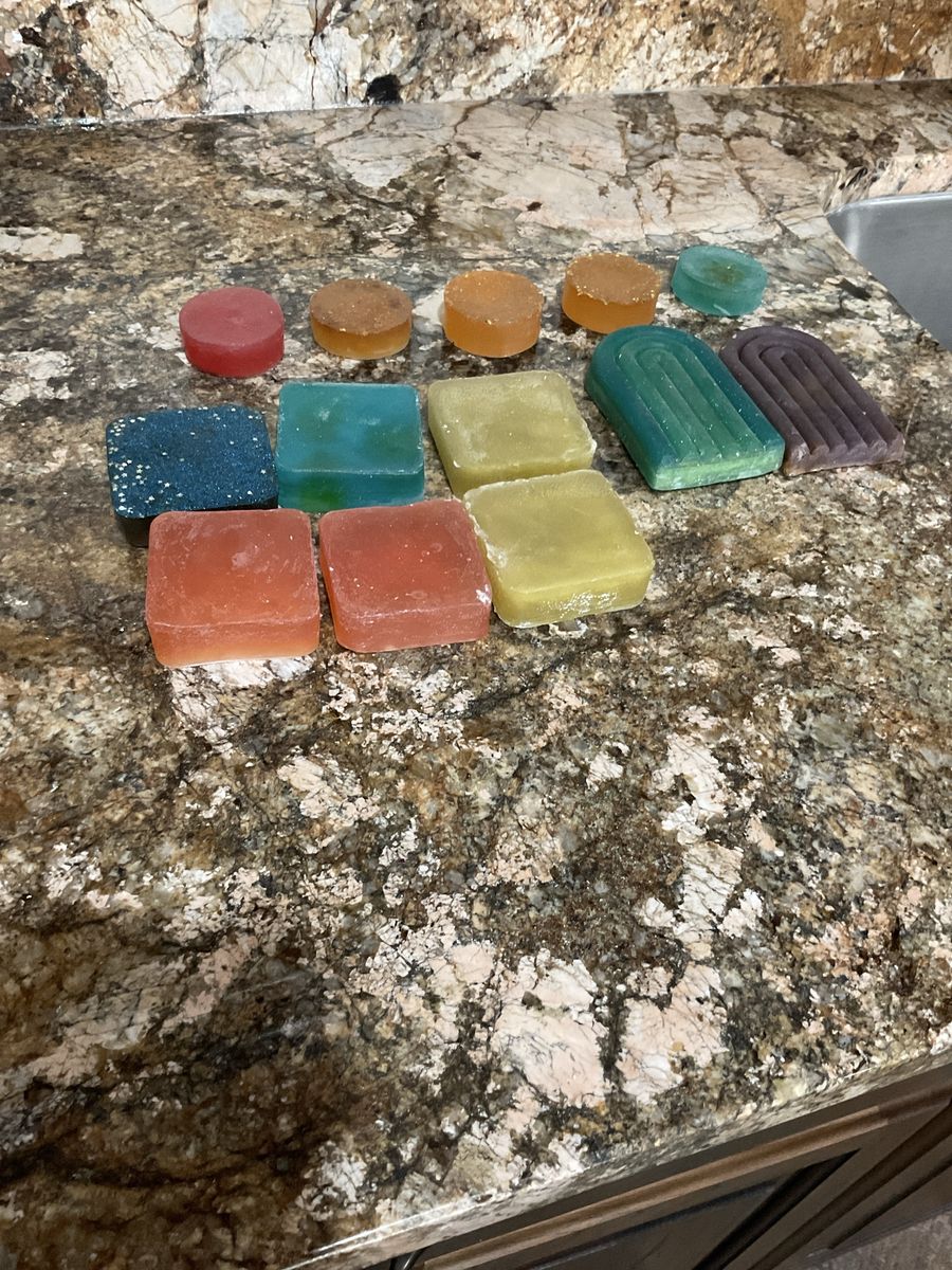 Handmade soap scented and colored, have lavender and rose leaves in them