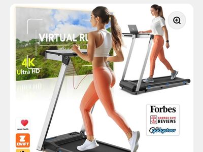 Still in the box. Foldable Treadmill with Desk