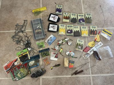 Lots of fishing lures and hooks $80.00 for all most NEW in packages