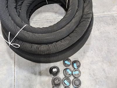 100' of 4" Perforated corrugated drainage pipe w/sleeve and caps/drainage spouts