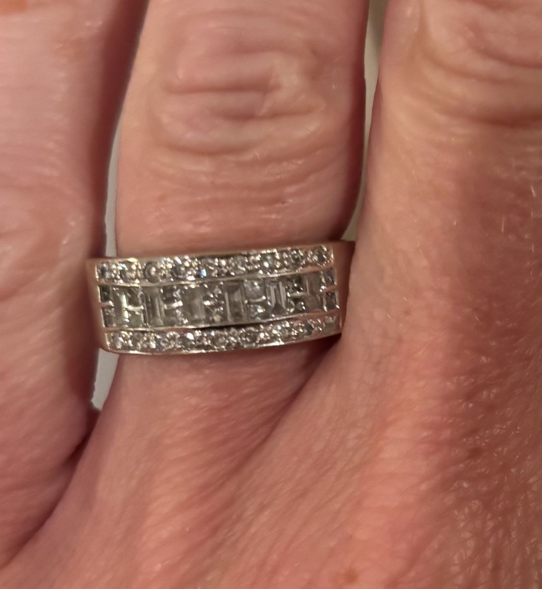 14KT Gold Ring .22 CT TW 6 Baguette Diamonds .35 CT 14 Princess Cut Diamonds .24 CT T Diamonds