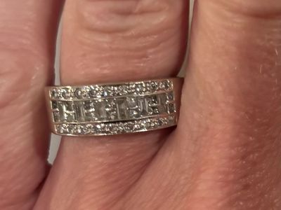 14KT Gold Ring .22 CT TW 6 Baguette Diamonds .35 CT 14 Princess Cut Diamonds .24 CT T Diamonds