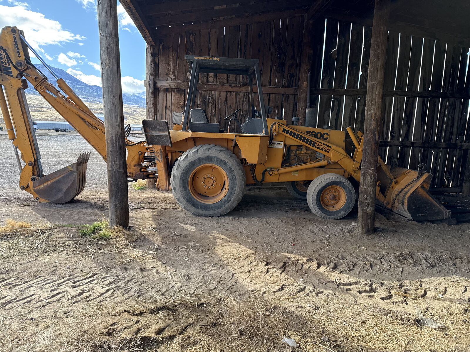 Case backhoe extend a hoe