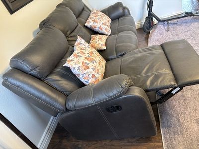 Comfortable Dark Gray Faux Leather Reclining Sofa and Loveseat Set with Cupholders