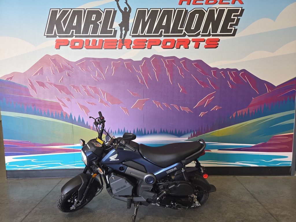 2025 Honda® Navi Pearl Red