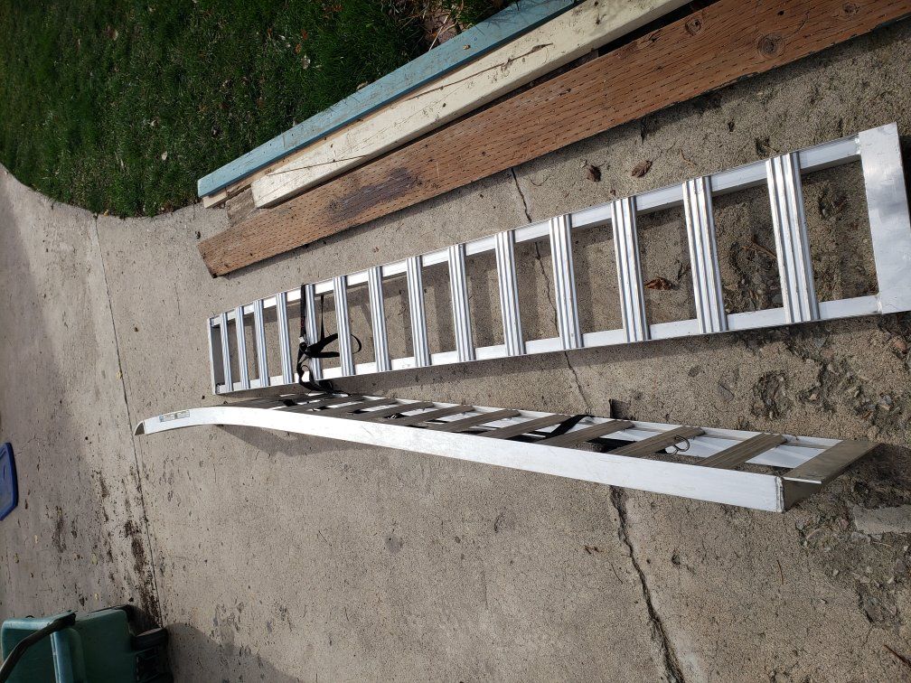 A pair of aluminum ATV loading ramps.