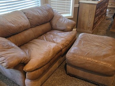 Natural leather love seat and chair with ottoman